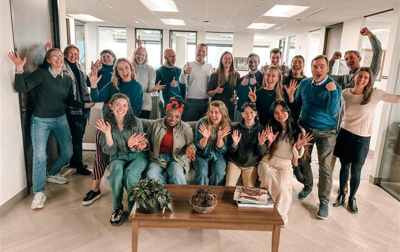 DNstaff - page - March2025 Excited staff posing for a picture outside