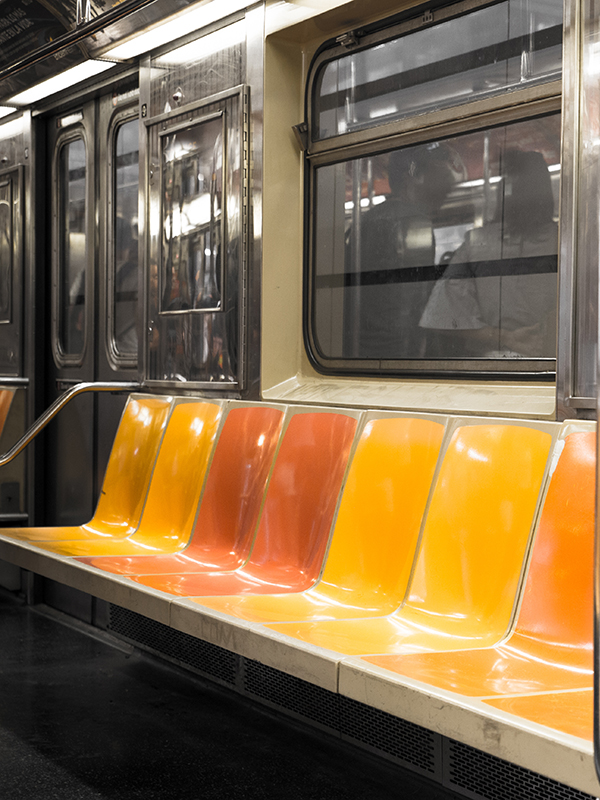 A row of public transit seats in New York City
