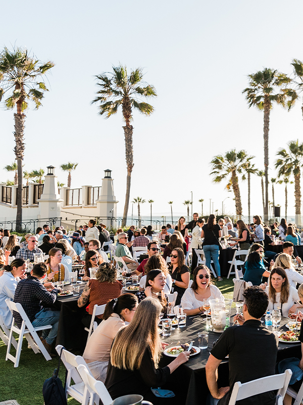 Header Image - Guiding Fehr and Peers into the Future - Post - January2020 Fehr & Peers staff eating at group gathering
