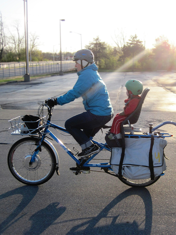 Header Image - Re-envisioning Long Range Transit Plans - Post - June2022 Mom and child riding bicycle safely