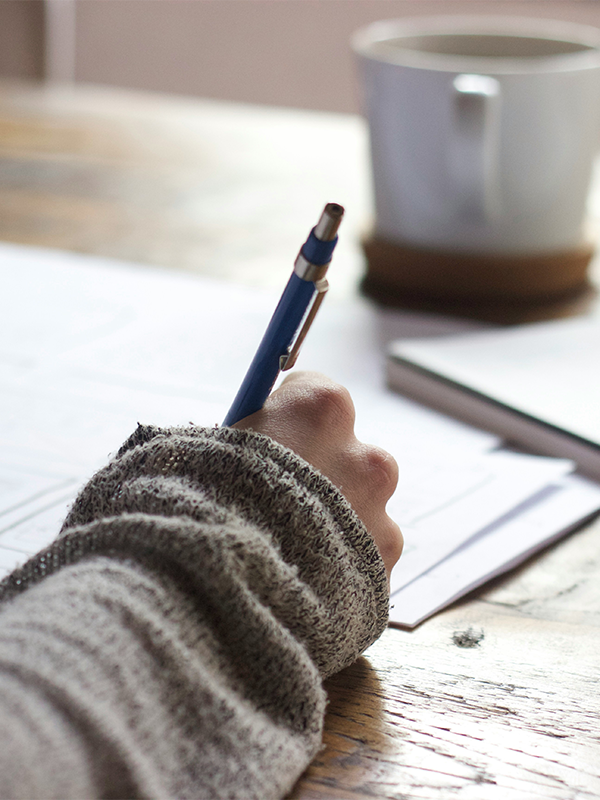 Header Image - Staff Certifications 2020 - Post - December2020 Writing notes with coffee in background