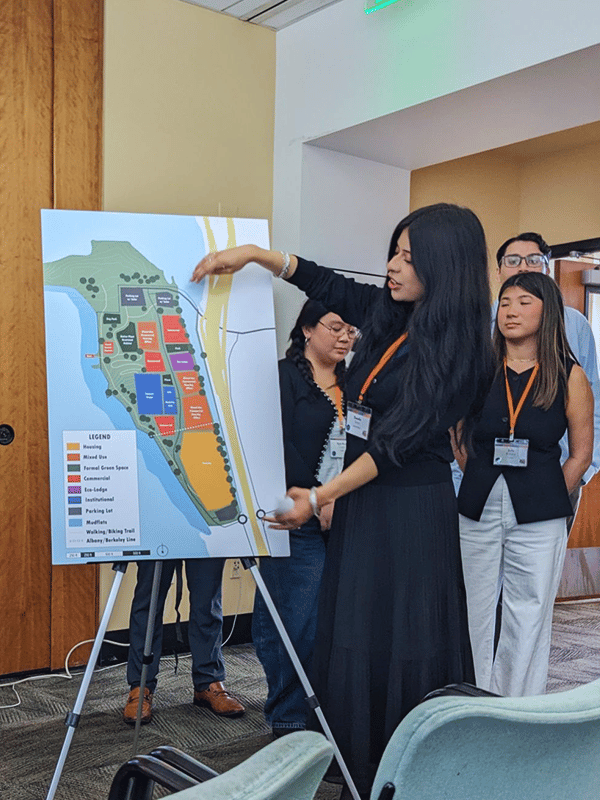 Intern presenting information on a map