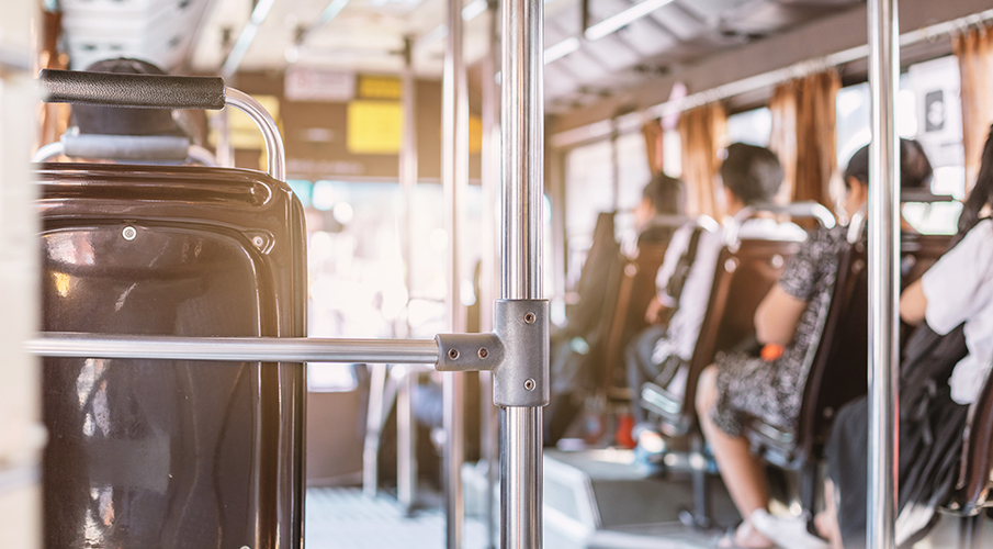 people riding a bus
