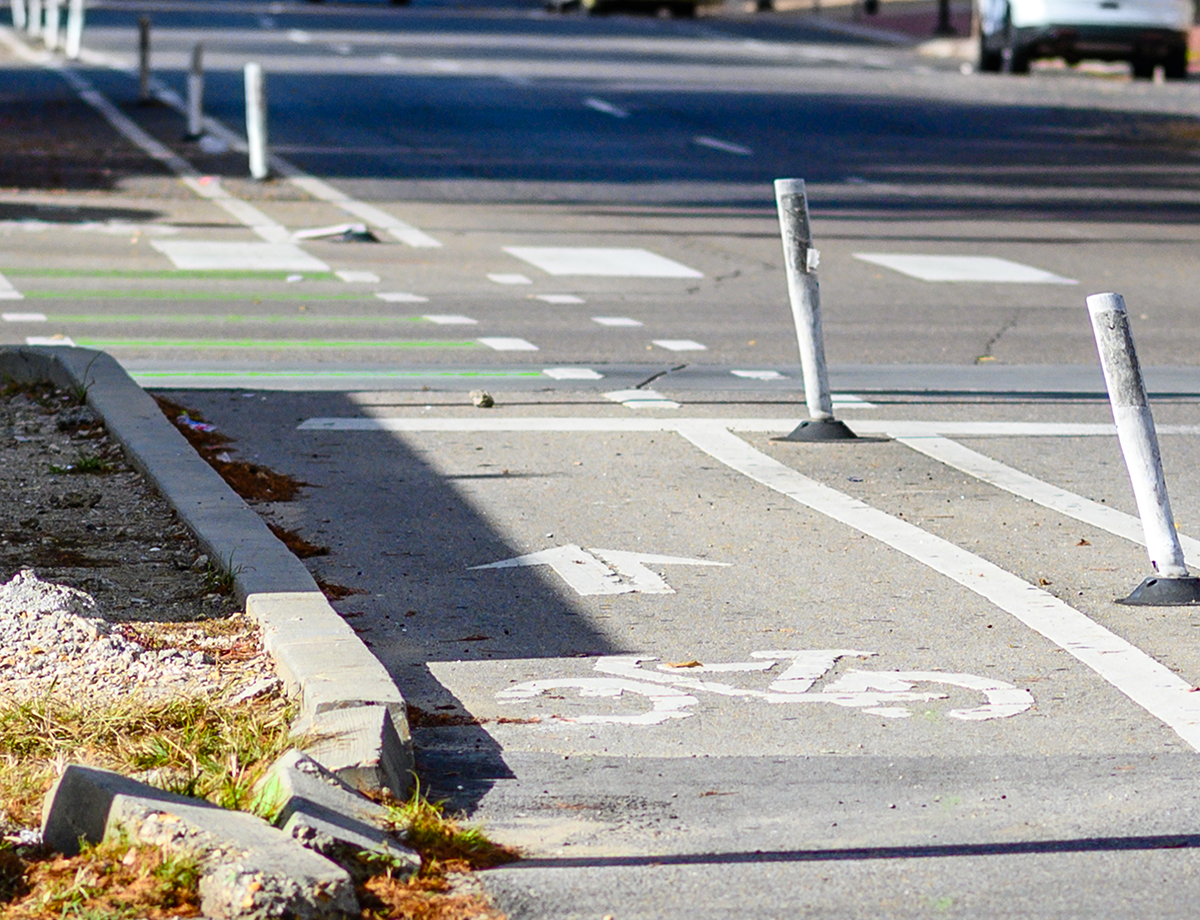 Closeup of a bike lane running parallel to a street