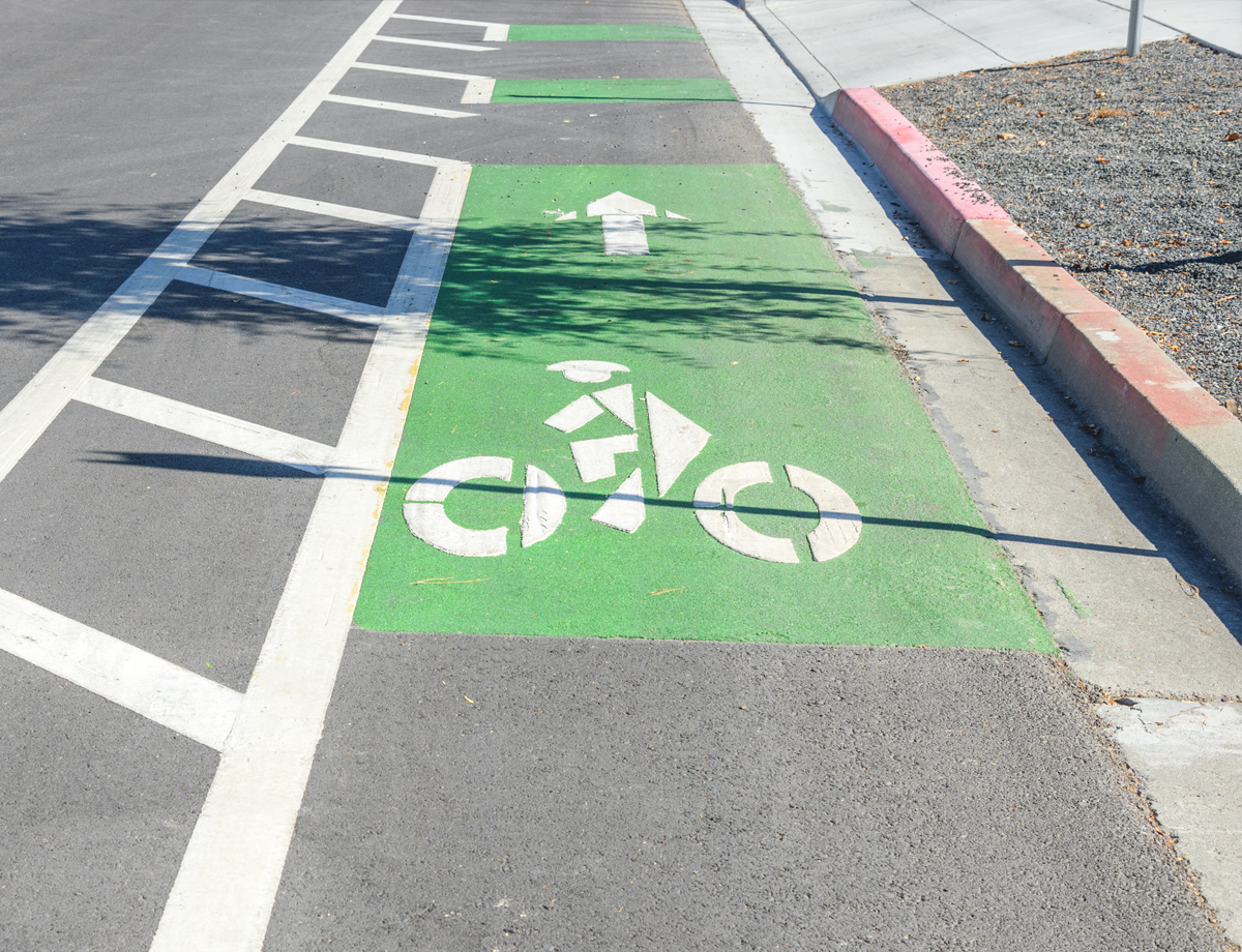 Bike lane with a painted buffer and green markings