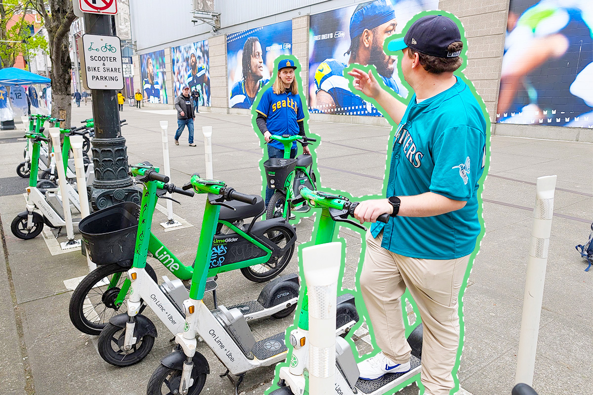 A Seattle resident getting on a parked scooter while waving to a nearby man wheeling out an electric bike.