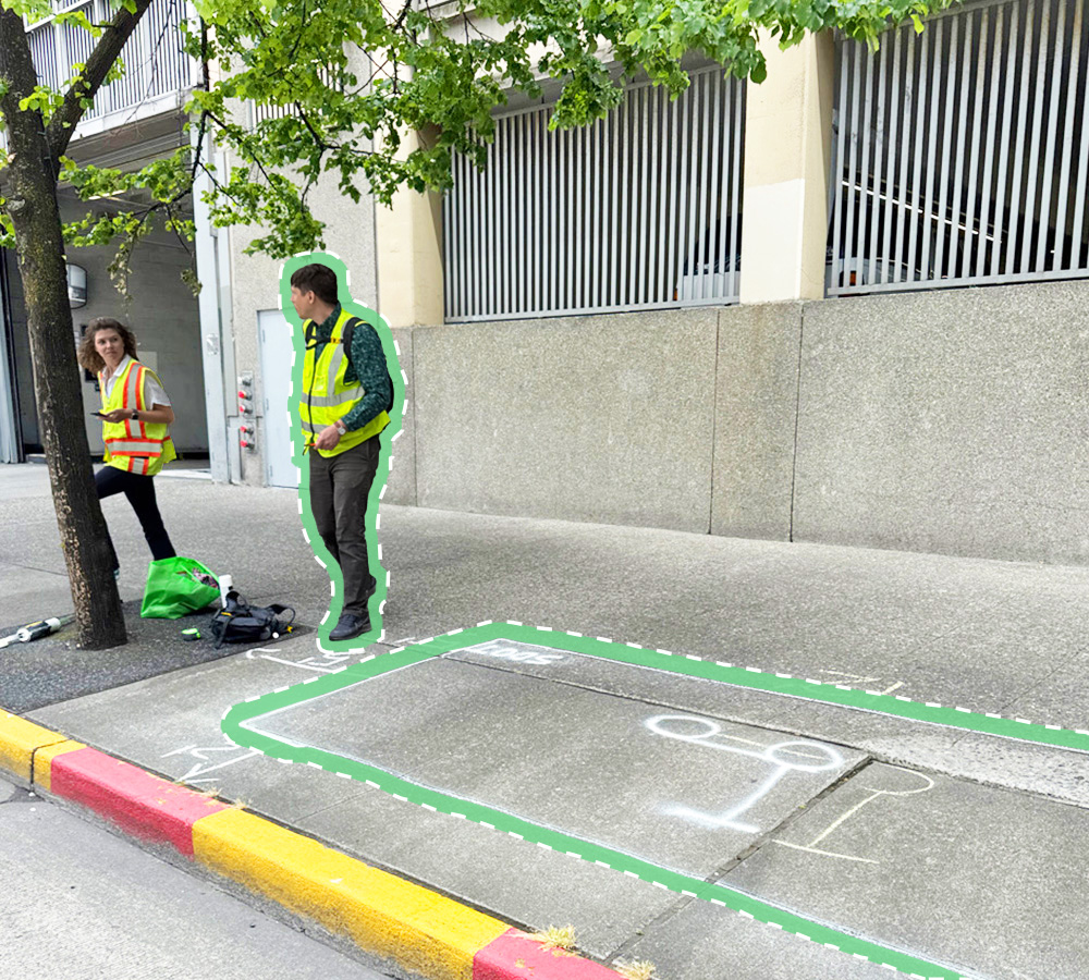 Chalk outline of curbside parking corral completed by the SDOT crew.
